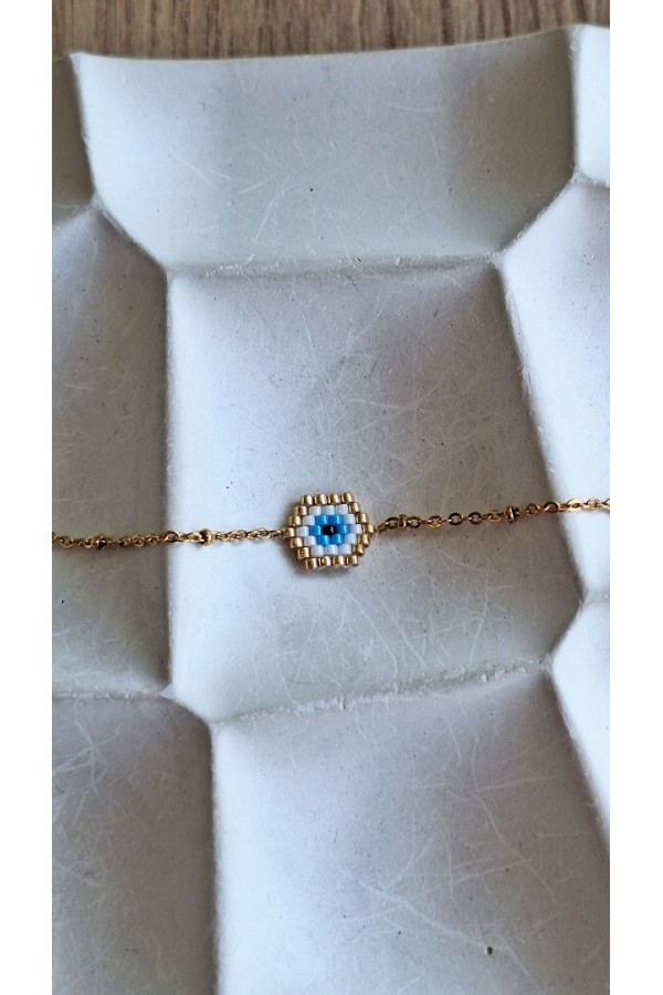 Χειροποίητo βραχιόλι με ματάκι από γιαπωνέζικες χάντρες Miyuki λευκό-χρυσό