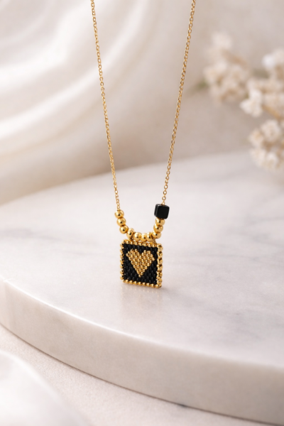 S.Steel κολιέ πλαίσιο καρδιά με γιαπωνέζικες χάντρες miyuki μαύρο-χρυσό 